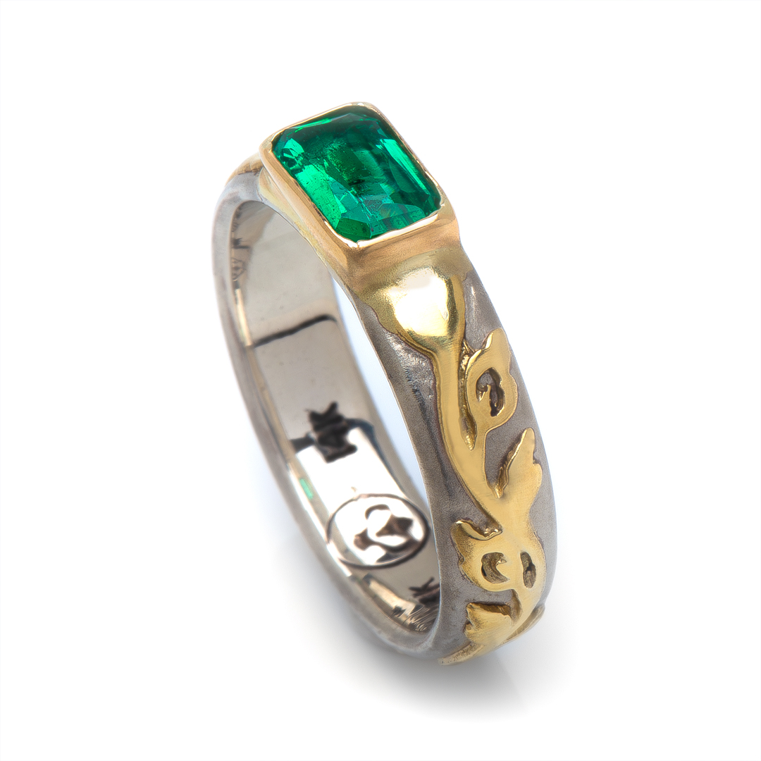 Flores Solitaire Engagement Ring in Emerald with 18K Gold Bezel