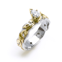 One of a Kind Narrow Borderless Flores Engagement Ring with Pear Moissanite in Two Tone