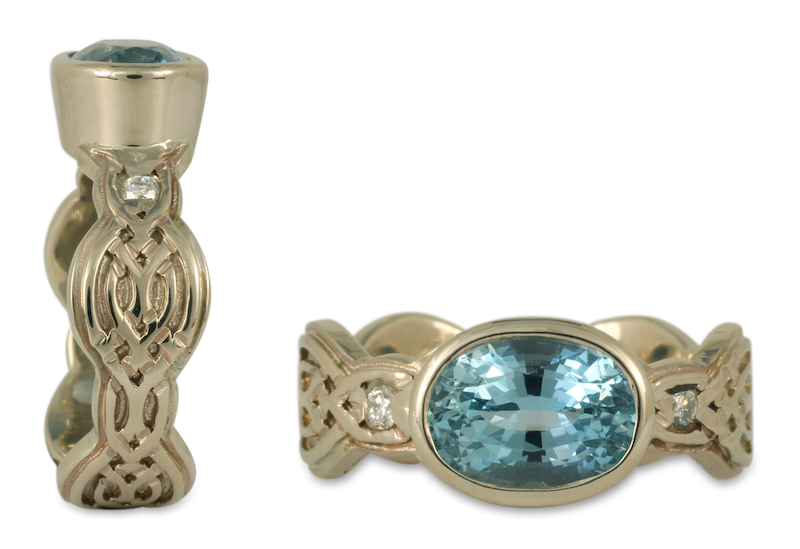 This 14K white gold engagement ring features an Aquamarine.